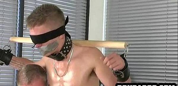  Blindfolded and tied up hunk getting his cock tugged